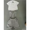 Vêtements Ensembles Bébé Mode Petits Garçons À Manches Courtes Chemise À Revers Short À Bretelles 2 PC Été Gentleman Costume Drop Livraison Enfants Mater Dh2Up