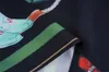 Camisa de diseñador para hombre, camisa informal de manga corta con botones, camisa de bolos estampada, camiseta transpirable de estilo playero, ropa #381