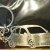 Llaveros Cordones Personalidad de los hombres Llavero único Forma de coche personalizado Llavero de acero inoxidable Accesorios de personalidad de los hombres Regalo del día del padre 230823