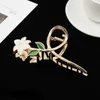 Accessori per capelli per copricapi Accessori Donne Metal Claw Eleganti fiori d'oro Clips Barretta Canna Cuccio di cavallo Accessori per capelli Tiara 230823