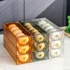 Kylskåp Egg Storage Box Automatiska skjutbara ägg Holder Rack Kök Matbehållare Kylskåp Sidan Dörr Organiser Daglig användning HKD230812