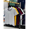 Mens Polos Verão Alto Conteúdo Algodão Polo Camisa Lapela Decote Listras Brancas Casual Shortsleeved Crown Bordado Tshirt M4XL 230823