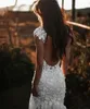 ビーチボーホーマーメイドウェディングドレス2023レースディープVネックラインキャップスリーブチャペルトレインプラスサイズの花嫁ガウンベスティドスデヴィア0509