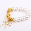 Bracelets porte-bonheur L008 doux Pulseras Bowknot simulé perle Bracelet perlé pour les femmes élastique arc bijoux de mariage bracelets