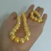 Chaînes élégantes mer du Sud 11-12mm collier de perles dorées 18 pouces