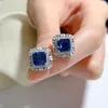 Серьги с свинениями 2023 мода Royal Blue 7 ушей, окруженные конными глазами и полными алмазными универсальными.