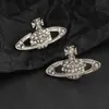 2023Saturn planet earrings minimalist and fashionable planet jewelry Empress Dowager West sparkling diamond 925 silver needle female earringsvivian