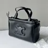 Cabas triomphe mode äkta läder mini cuir cabas dragstring väska handhållen en axel crossbody väskor005