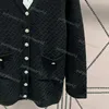 Mode stickad långärmad casual tröja höst v hals dimensionell mönster midi mönster tröja lös stickad kofta