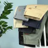 Merkkleding Heren recht passende pakpak Mannen Spring zomerbedrijf Stretch Gray Khaki Zwarte dunne broek Manne Man Size 40 42LF20230824.