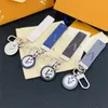 Brand Designer Fashion Young Car Letter New Women's Bag Lanyards Love Charm Couple Keychain Leather Small Jewelry
