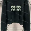 Zimowe swetra damskie dzianiny stylowe litera