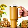 Bottiglie d'acqua Bicchiere personalizzato da 40 once con manico Coperchio Cannuccia Bottiglia da 40 once in acciaio inossidabile Thermos sottovuoto Tazza da caffè per auto da viaggio 230825