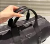 مصمم حقيبة Duffle Classic Nylon Fraving Lagage Fashion Men Men Top جودة مشتركة موقعة مشتركة للسفر في الهواء الطلق أكياس الكتف حقائب اليد