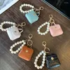 Nyckelringar Söta mini -mynt Purses Pearl Chain Keychain Small Earphone Box Soft Pu Leather Hasp Key Organizer Bag Car Ring Wallet Pouch