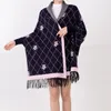 2023 autumn/Winter warm shawl with women's long-sleeved long knitted cape double-sided fringe scarf for dual use