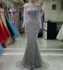 2023 août Aso Ebi Silver Sirène Prom Dress Crystals Crystals Sexy Soirée Fête formelle Deuxième réception Robes de fiançailles d'anniversaire robe Robe de Soire ZJ715