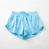 Short de course femme vêtements de sport Tennies Badminton poches zippées faux 2 pièces pantalons