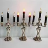 Halloween Skull Candle Triple Skeleton Flameless Candle Holder Stand LED Lamp Tabletop Decor For Haunted House Parties Screen HKD230825