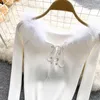 Kvinnors tröjor Autumn Fashion Design päls lapptäcke snörning V-ringning långärmad kroppskondestunika sexig stickade korta stickor tees