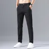 ¡Novedad de 2023! Pantalones Chinos caqui ajustados de seda hielo para hombre, pantalones informales de negocios elásticos de alta gama a la moda para primavera y veranoLF20230824.