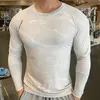 T-shirt da uomo Camicia da corsa di marca Camicia da palestra a maniche lunghe da uomo Abbigliamento sportivo da uomo Camicie a compressione asciutta per uomo Fitness T-shirt sportiva attillata 230825