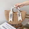 Diseñador Casual Vacaciones Bolsas de playa Carta de hombro Bufanda de seda Bolsa tejida de paja portátil Versátil Semi circular Mujeres S Bolsos de ratán Bolsas de compras Monederos Cartera