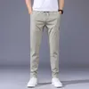 Summer Men's Casual Pants Thin Soft Soft Elasticity Lace-up midja Solid Color Pocket Applique Korea Gray Black Work Trousers Male 38LF20230824.