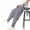 Pantaloni da uomo Arrivo Stile giapponese Baggy Bloomers Pantaloni in cotone e lino Harem da uomo Pantaloni solidi con fascia alla caviglia Uomo M66 230824