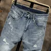 Mäns jeans rippade män mager ljusblå hög gata stil manlig elasticitet smal passform frayed casual byxor byxor biker 230825