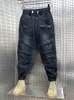 Heren jeans stapels hiphop jeans unieke zwarte stretch cowboybroek in lente herfst harembroek luxe merk streetwear 230825