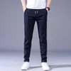 Summer Men's Casual Pants Thin Soft Soft Elasticity Lace-up midja Solid Color Pocket Applique Korea Gray Black Work Trousers Male 38LF20230824.