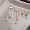Designer smycken halsband kvinnlig mode temperament rund pärla tofs örhängen designer halsband blommor benkedja kedja
