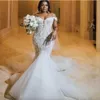 Abiti da sposa sexy a sirena con spalle scoperte 2023 Arabo Aso Ebi Abiti da sposa senza schienale in pizzo Corte dei treni Abiti da sposa Plus