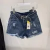 Jeans para mujer Absgd 2023 Colección Cinturón de hebilla de metal Cintura alta Vintage Agujeros rasgados Azul Slim Denim Shorts Mujeres Corto