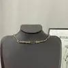 Colliers avec pendentif classique de styliste, Double lettre pour femmes, chaîne en or 18 carats, bijoux colorés, hypoallergéniques, cadeau de saint-valentin