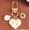 New Love Alloy Key Ring Pendant Creative Hollow Small Flower Letter Round Card Accessories Aypear Sleeves Decoration