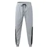 Calças masculinas Mens Mid-Cintura Casual Corredores Sweatpants Slim Atlético Yoga com Bolsos Rua Sólida Calças Esportivas Pantalones