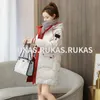 Long cotton-padded woman 2023 new autumn and winter clothing loose large size women's cotton-padded jacket bread dress winter women's stone coat