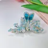 Färgglada acetat Spirit Shape Rhinestone Crab Hair Claw for Women Temperament Ponytail Clamp Barrettes Hårklipp Tillbehör