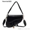 Womens Bag Designer Spring New Single Shoulder Messenger Personalized Saddle Bag Korean Solid Color Literary Trend Bag