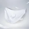 Cuecas masculinas calcinha de seda gelo sem costura cuecas meados de cintura respirável shorts de secagem rápida transparente ultra-fino sexy roupa interior verão