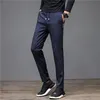 Tracki męskie zimowe ciepłe światło polarowe swobodne spodnie Slim Classic Brespants Solidny kolor koreański styl wiatroodpodący mężczyzna 28 38 230825