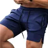 Męskie spodnie joggingowe atletyczne z suwakiem