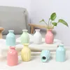 Vasi 1PC Mini vaso di fiori moderno disposizione della casa soggiorno origami ceramica plastica decorazione in stile nordico ornamento