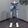 Jeans da uomo Streetwear Moda Uomo Retro lavato blu elasticizzato Slim Fit strappato dipinto Designer pantaloni in denim vintage Hombre