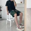 Mäns shorts llit Rhude Cashew Flower Sticked High Street American Quarter Shorts Fog Fashion Märke Populära mäns lösa dragbyxor