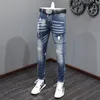 Jeans da uomo Streetwear Moda Uomo Retro lavato blu elasticizzato Slim Fit strappato dipinto Designer pantaloni in denim vintage Hombre