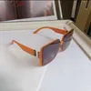 デザイナーの新しいサングラスオレンジ女性のスリムなファッションボックスメガネUV保護特別