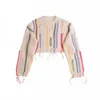 Tidig hösttröja Net Red Women's New ColorBlock Stripe Hole Cut Out Tassel Loose mångsidig kort stickad skjorta för kvinnor